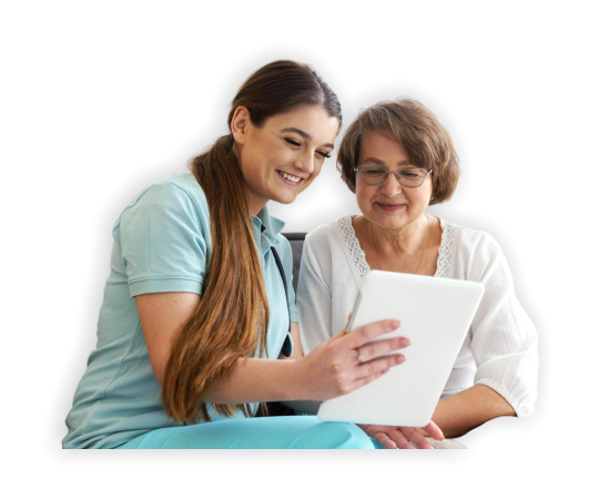 happy caregiver holding a tablet with elderly beside her